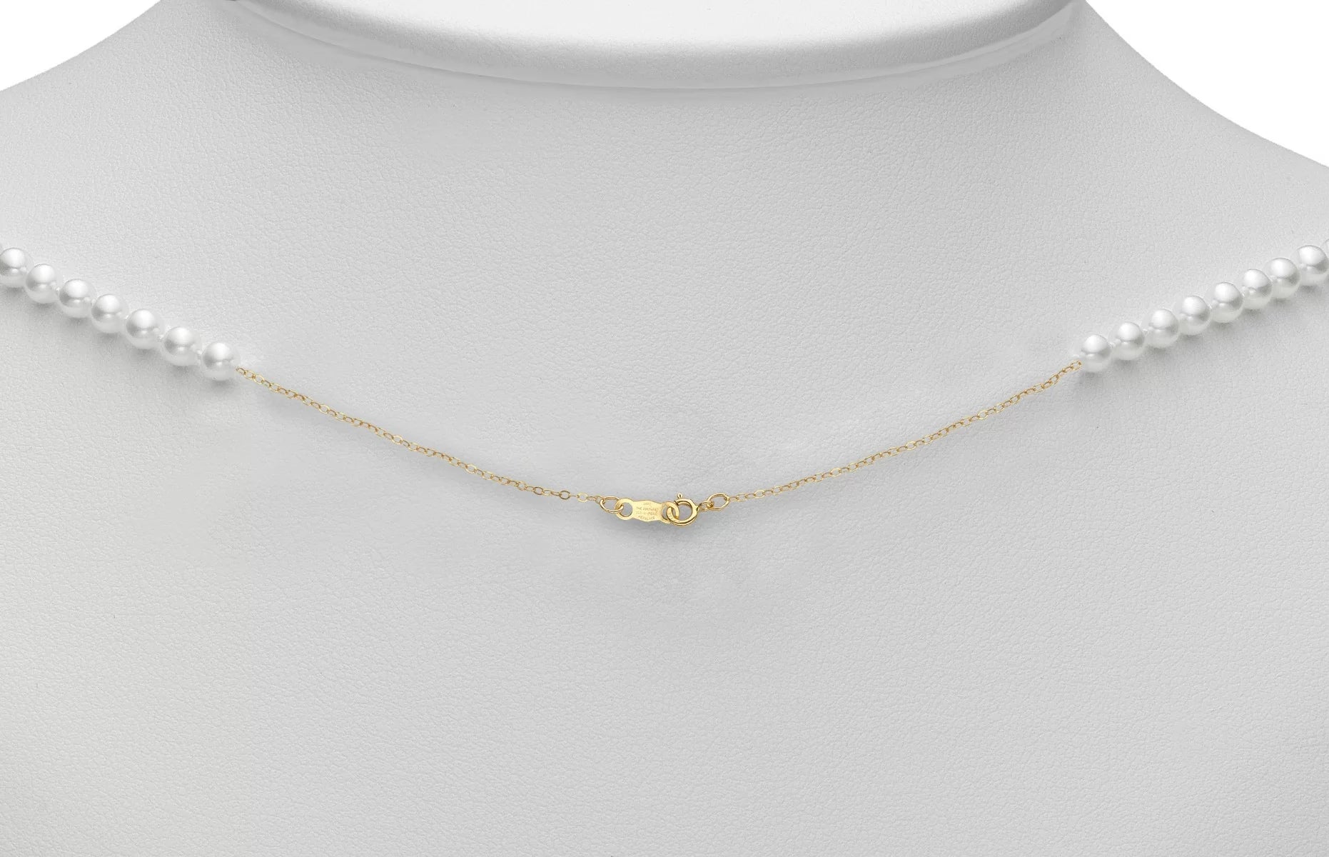 Gold pearl necklace with a starter clasp