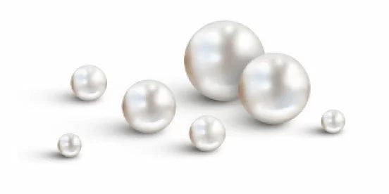 Set of pearls of various sizes on a white background