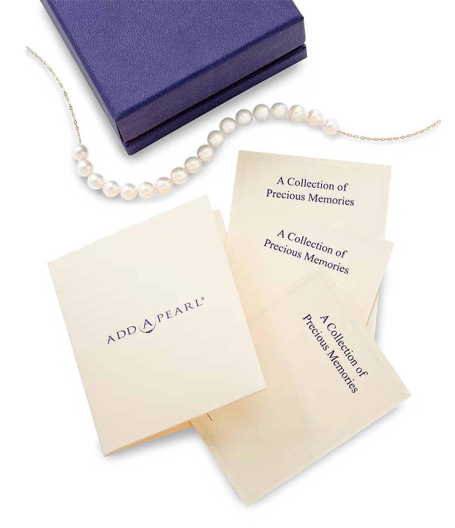 Pearl necklace with Add-A-Pearl notecards and purple gift box