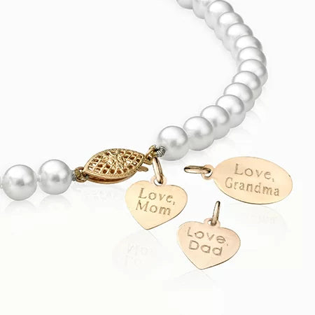 Pearl necklace with gold charms with personalized engravings