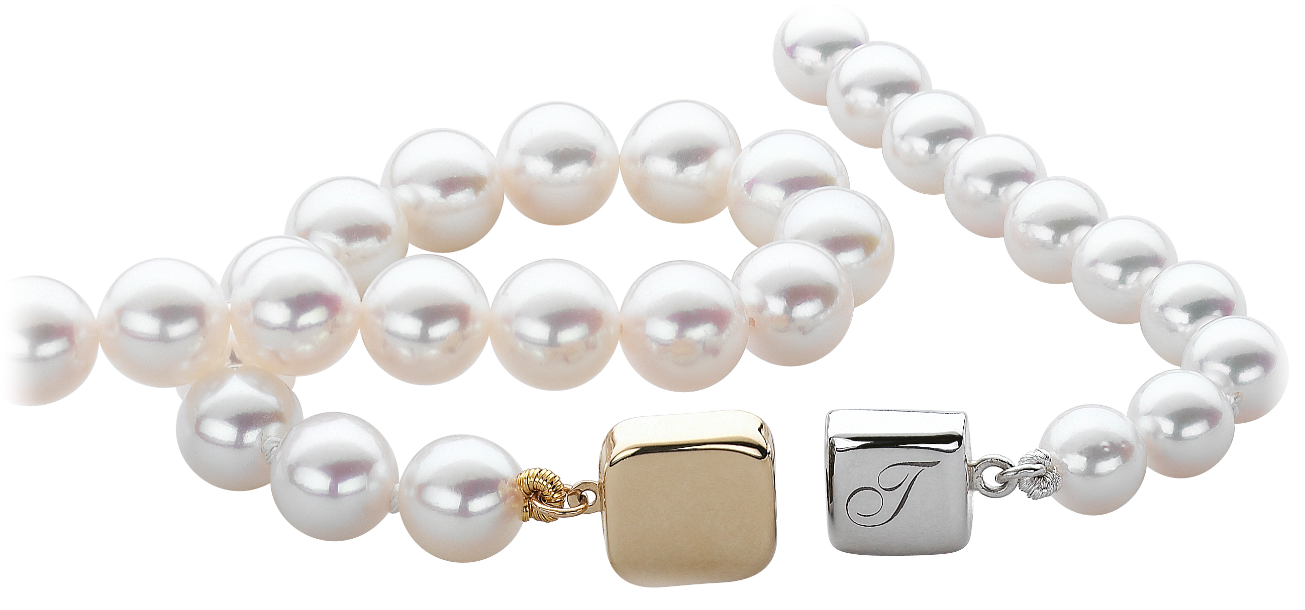 Cultured pearl strand finished with engraved gold and silver clasps
