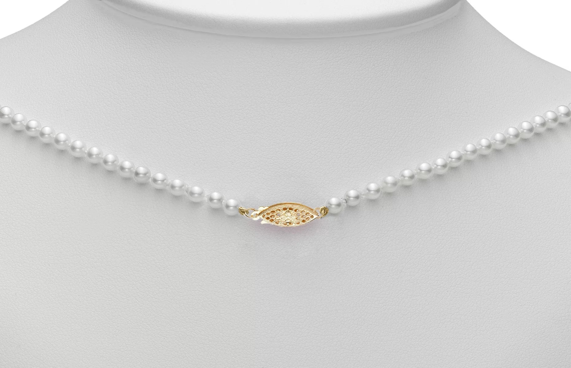 Pearl necklace with a gold filigree clasp