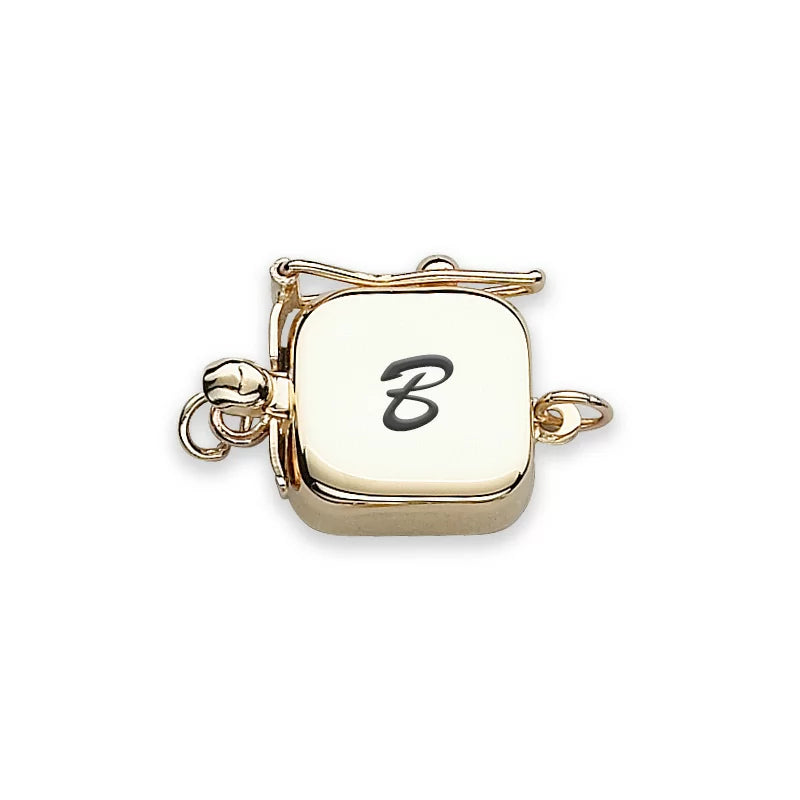 Clasp engraved gold script